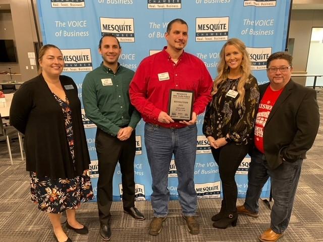 Revolution won the Employer of the Year. Plant Manager Brandon Thompson (center) and other staff accepted the award.